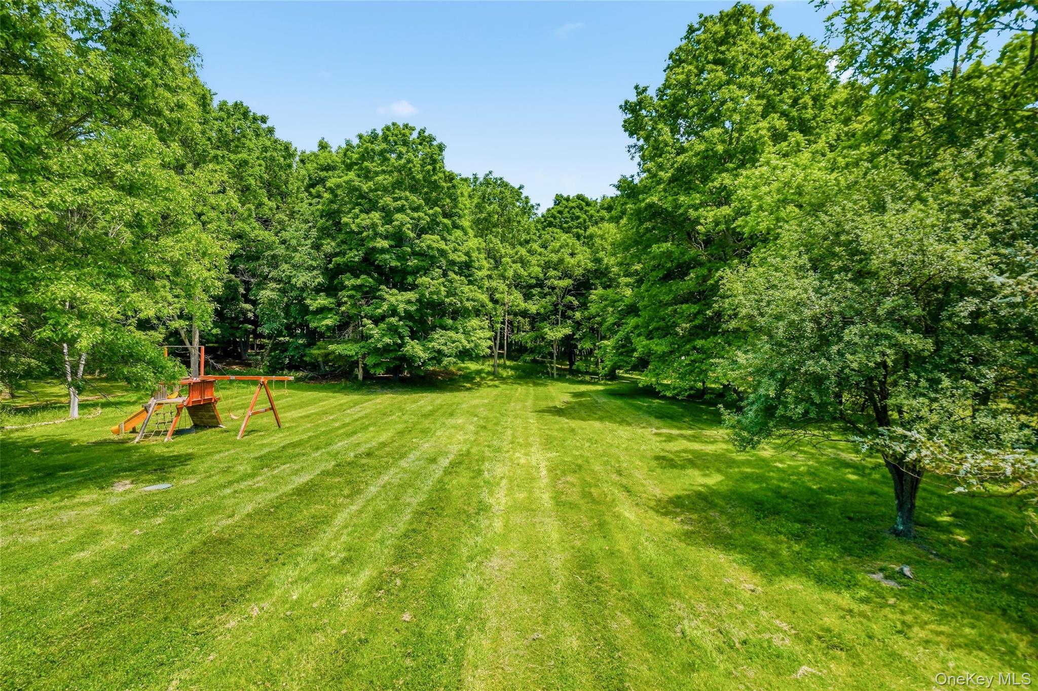 5 Horton Road Washingtonville, NY 10992 - Photo 39 of 42 a view of a backyard with swimming pool
