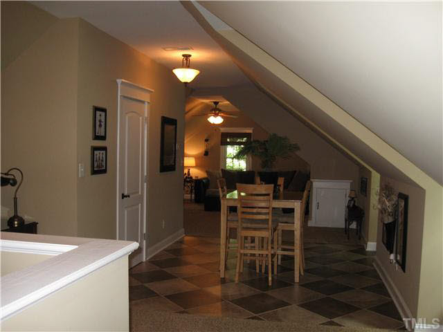 8809 Wellsley Way Raleigh, NC 27613 - Photo 19 of 25 Another angle of bonus room... Could easily have another bedroom. A 3rd bathroom is already plumbed as well.
