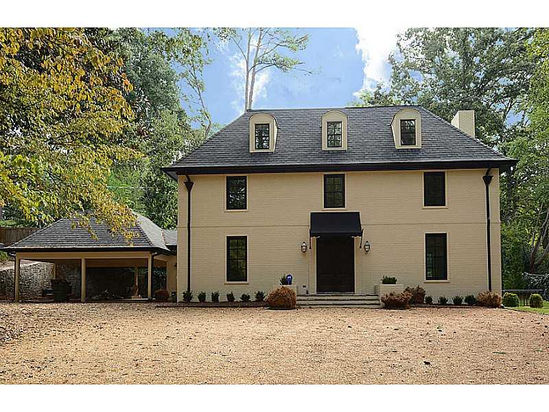 Facade/Exterior Front. Beautiful complete renovation, with 2-car carport and pea gravel front car park with ample room for guests.