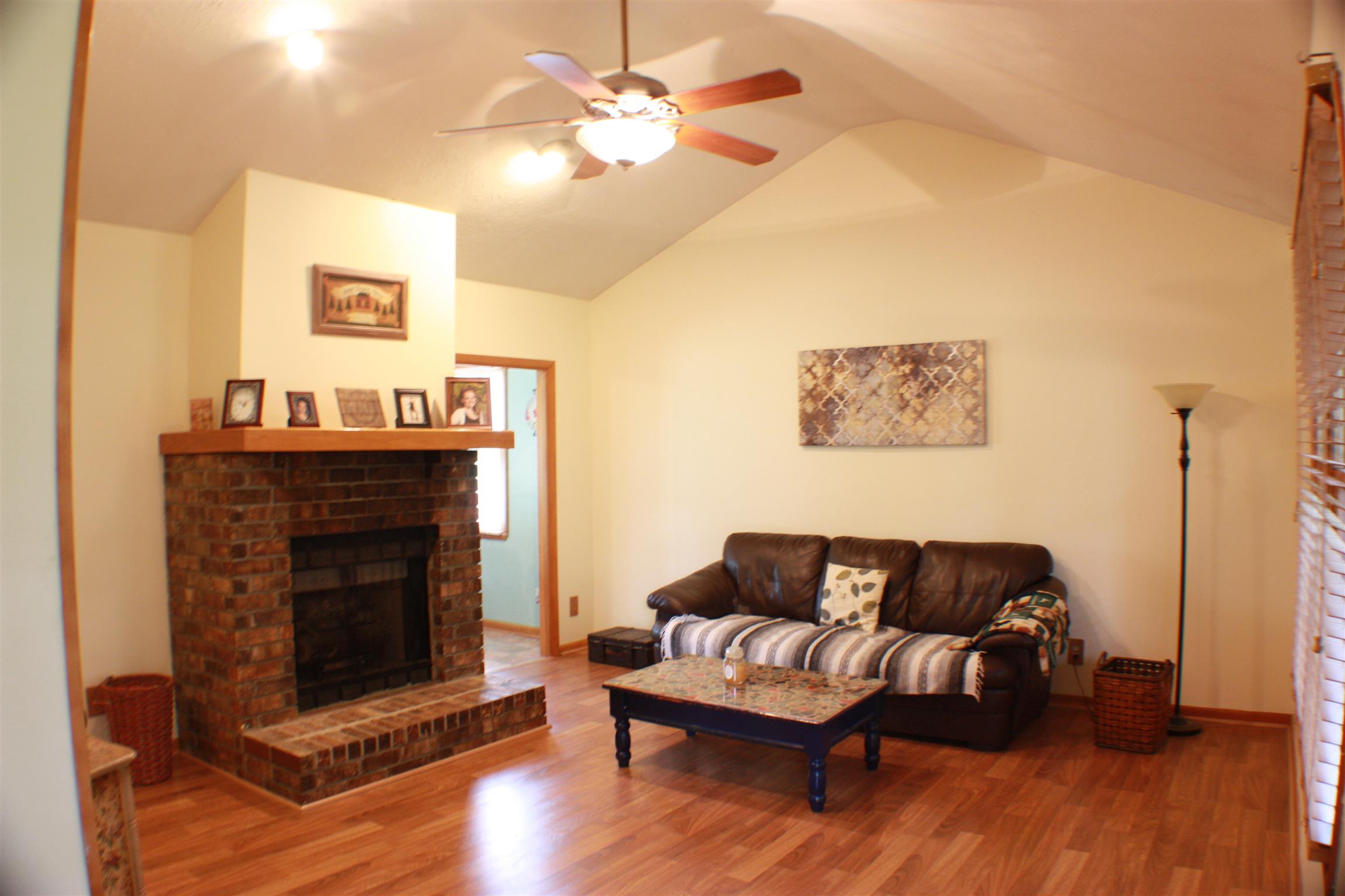 201 Vantrease Road Cottontown, TN 37048 - Photo 4 of 13 a living room with furniture and a fireplace