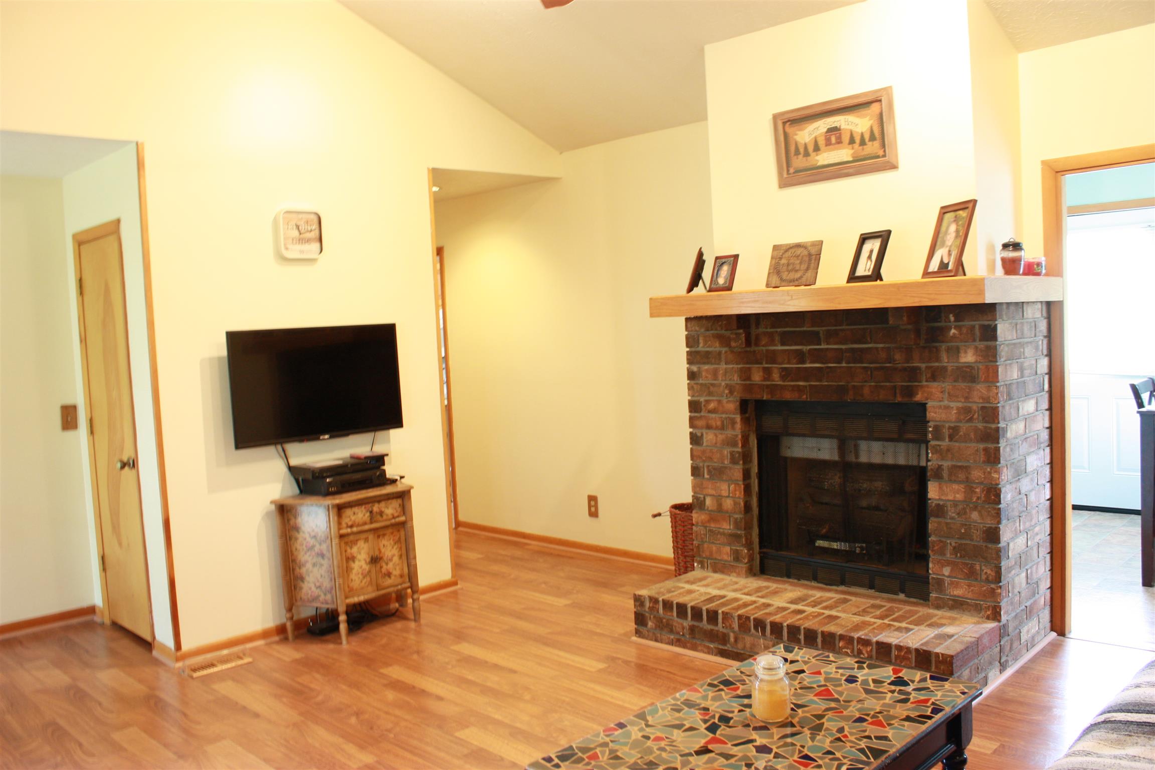 201 Vantrease Road Cottontown, TN 37048 - Photo 5 of 13 a living room with furniture and a fireplace