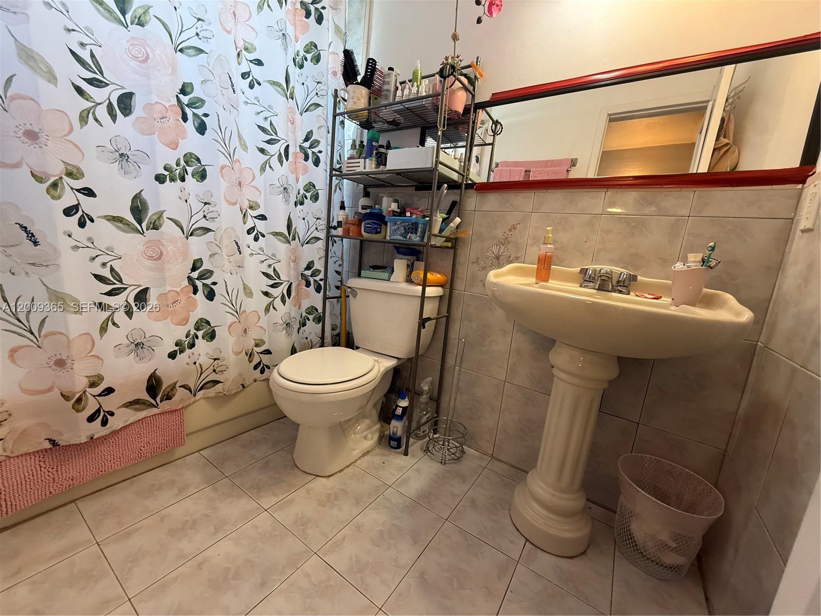 25835 Southwest 131st Court Homestead, FL 33032 - Photo 20 of 33 a bathroom with a sink and toilet
