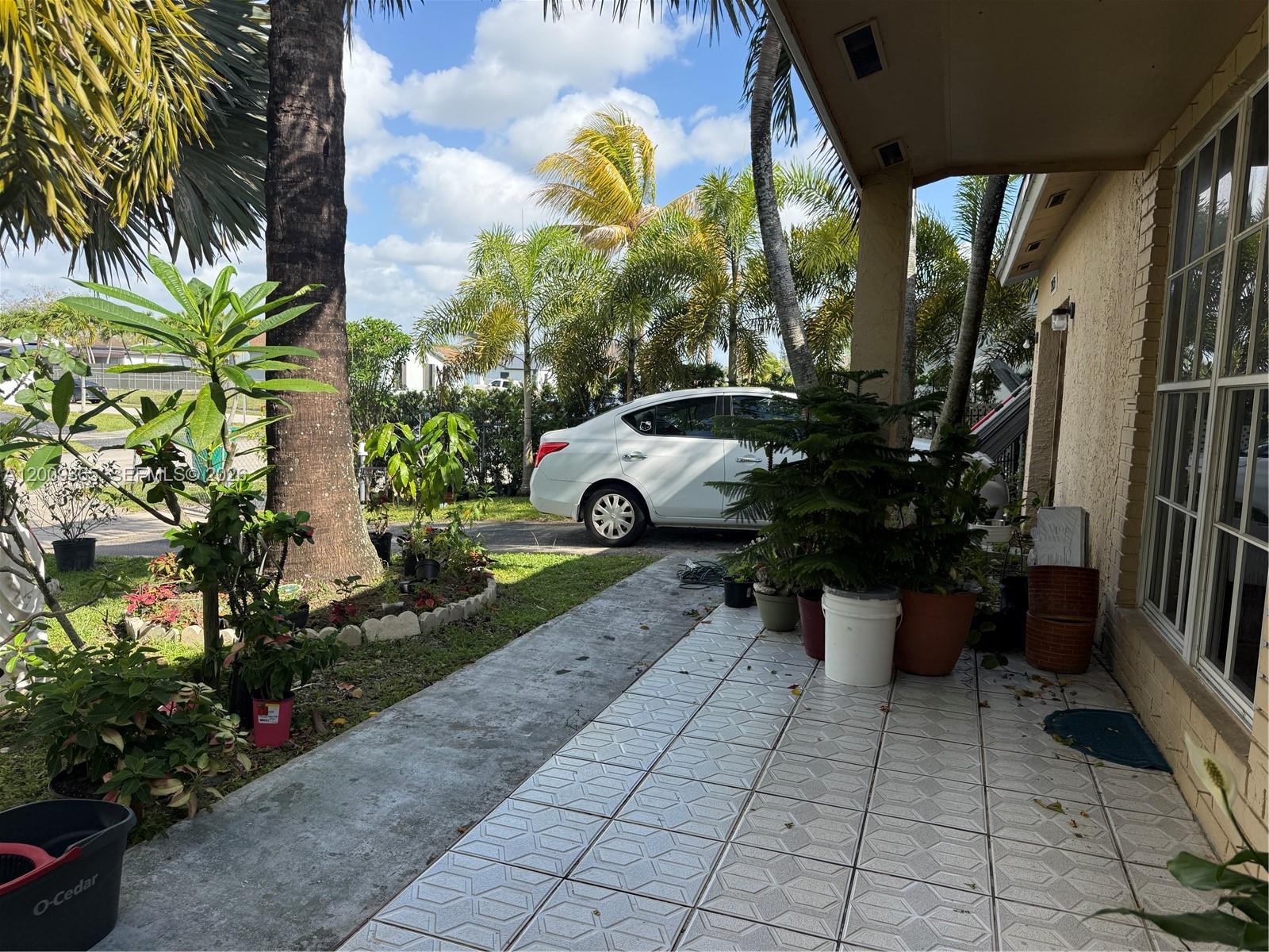 25835 Southwest 131st Court Homestead, FL 33032 - Photo 26 of 33 a view of outdoor space yard and patio