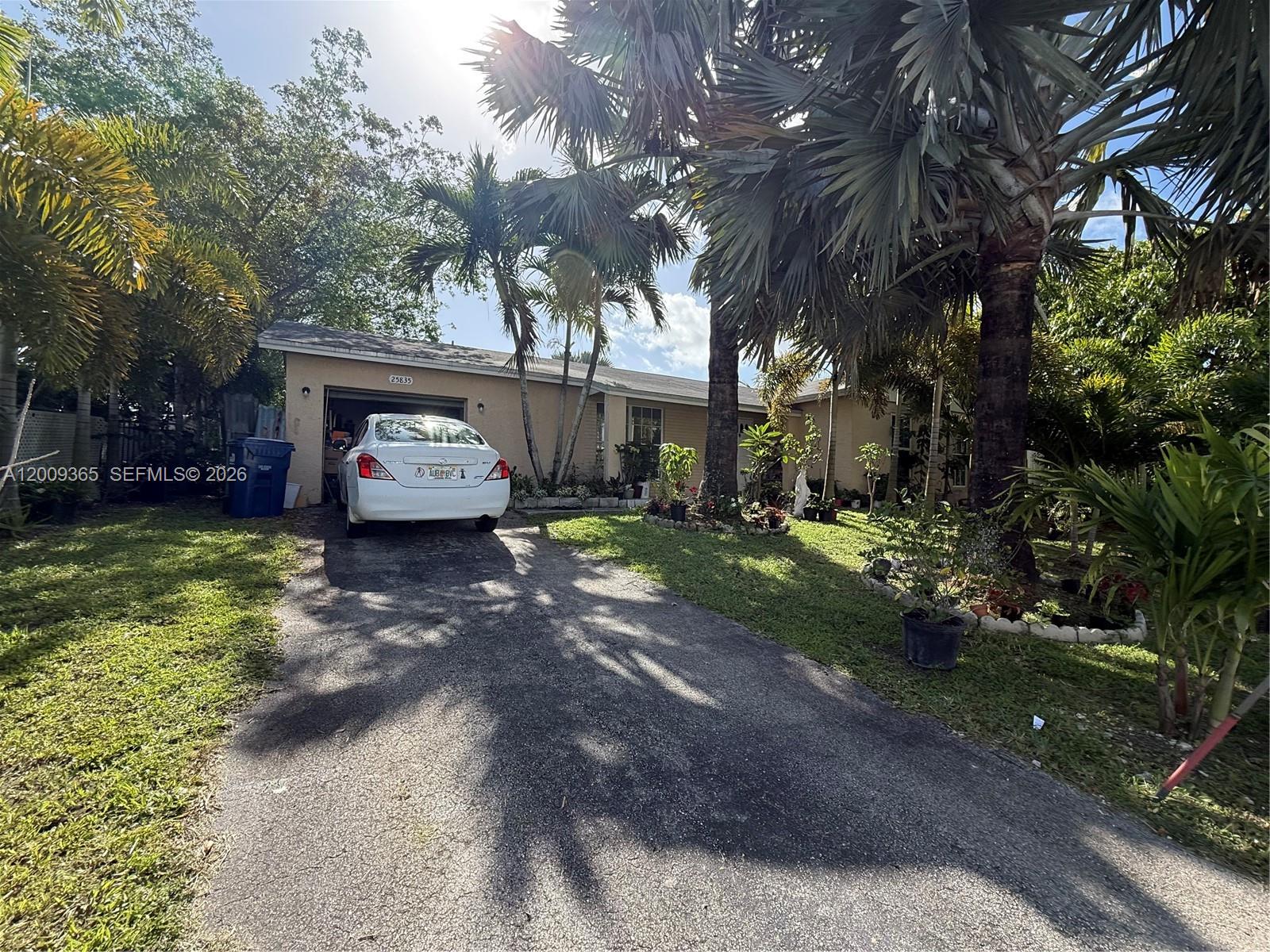 25835 Southwest 131st Court Homestead, FL 33032 - Photo 30 of 33 a house view with a garden space