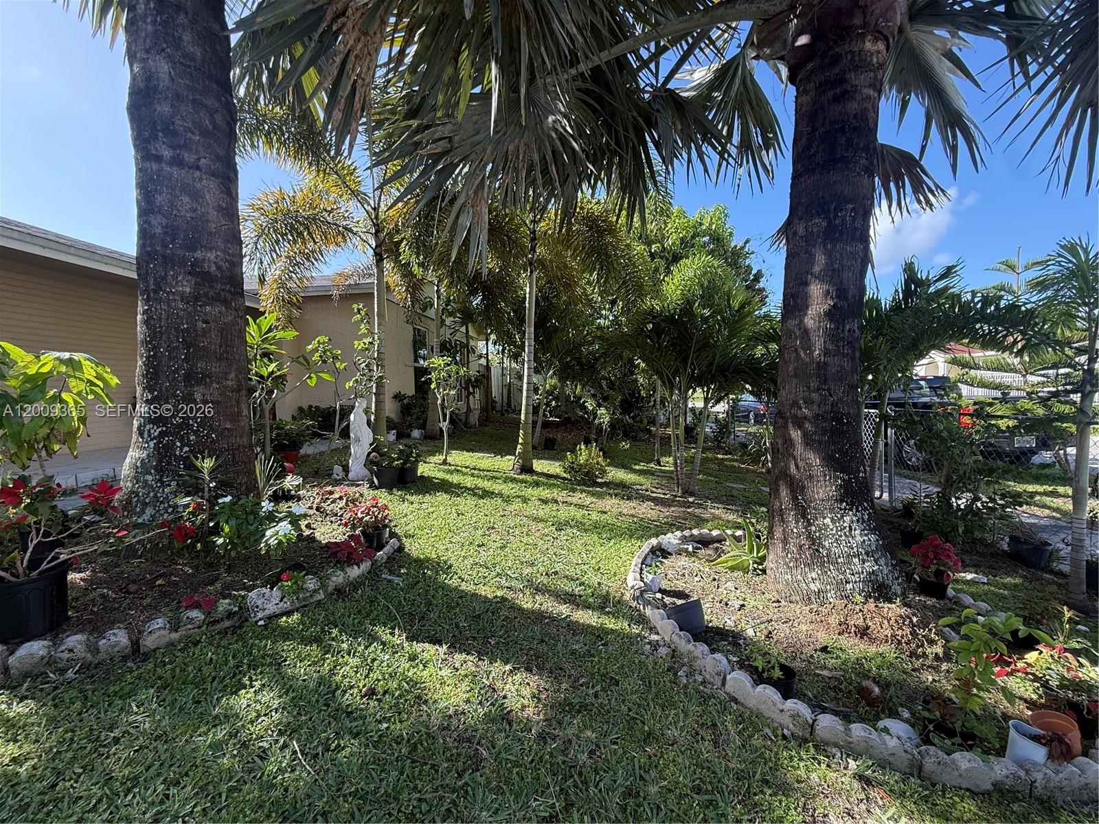 25835 Southwest 131st Court Homestead, FL 33032 - Photo 3 of 33 a view of a backyard with a garden