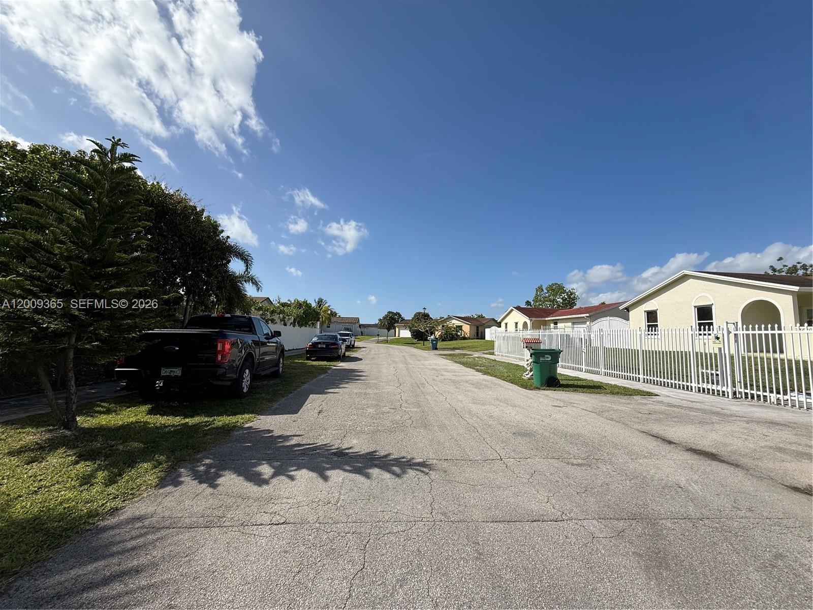 25835 Southwest 131st Court Homestead, FL 33032 - Photo 32 of 33 a view of a house with a yard