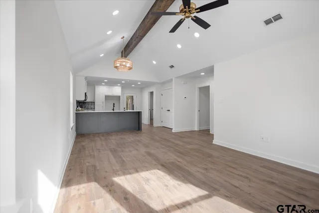 a view of kitchen and windows