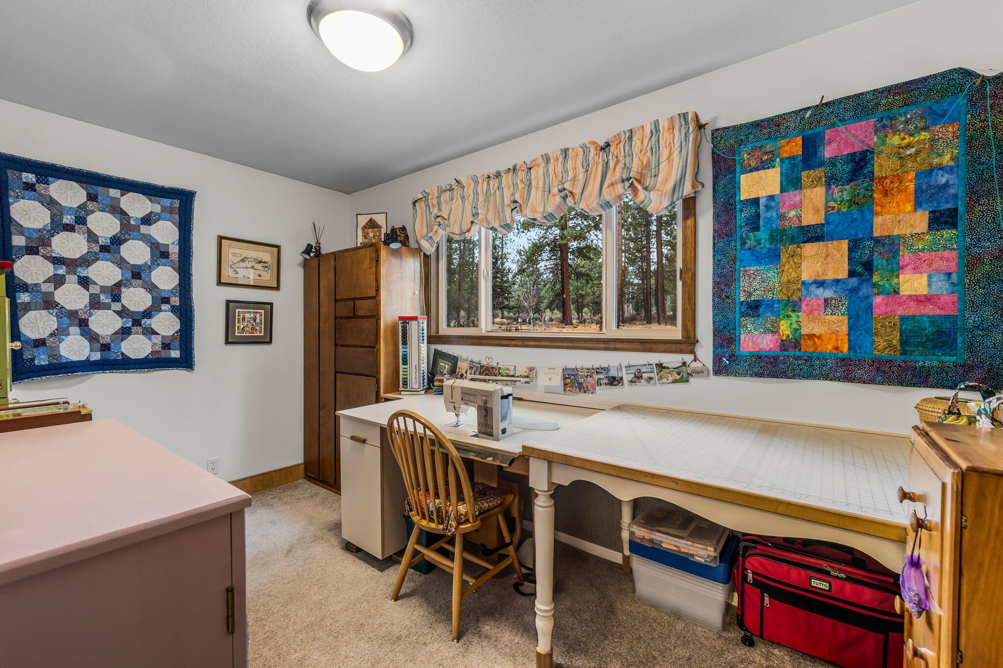 60290 Woodside Loop Bend, OR 97702 - Photo 30 of 47 Sewing Craft room with added storage space.