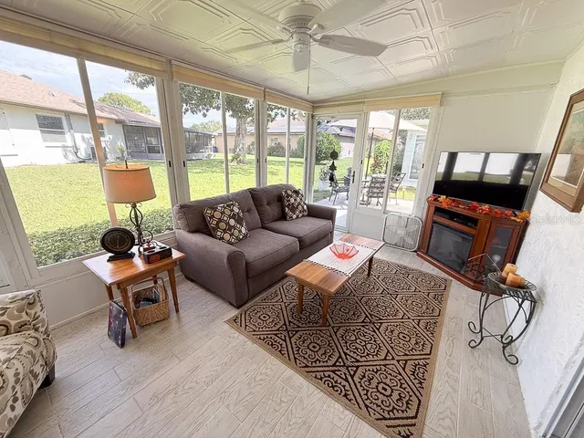 a view of a storage room with furniture and a window