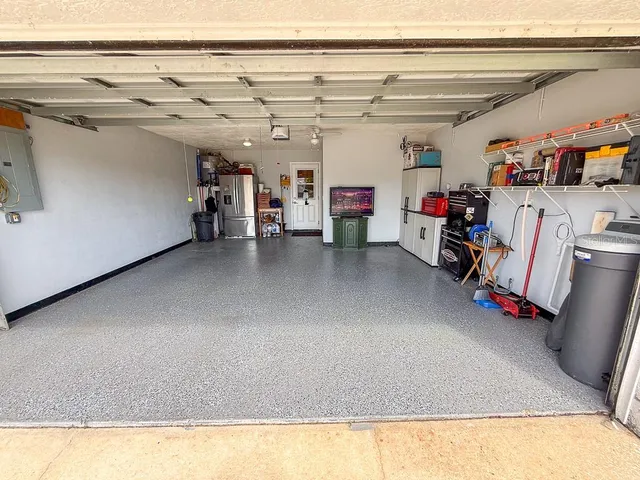 a view of a chair and table on the patio and a chair
