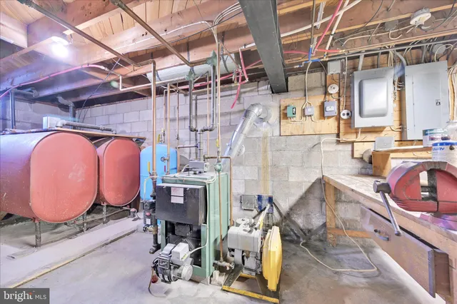 a view of empty room with wooden walls