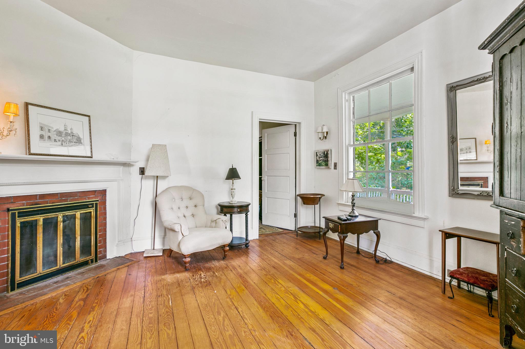 721 Cliveden Road Baltimore, MD 21208 - Photo 22 of 58 Sitting room with fireplace