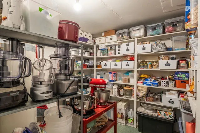 a room with storage and utility room