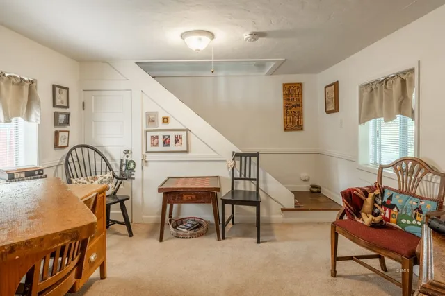 a bedroom with furniture and a bed