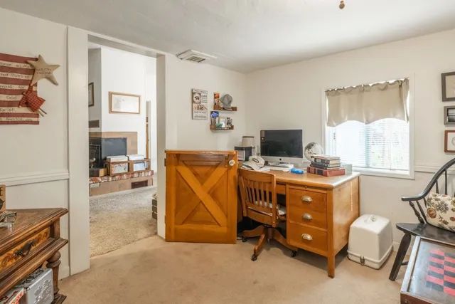 a room with furniture and flat screen tv