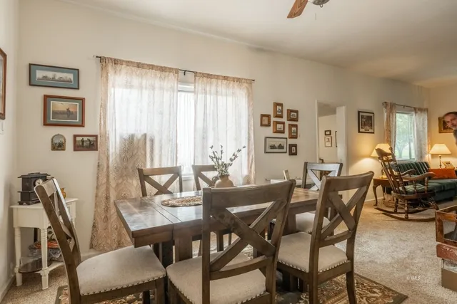 a view of a dining room with furniture