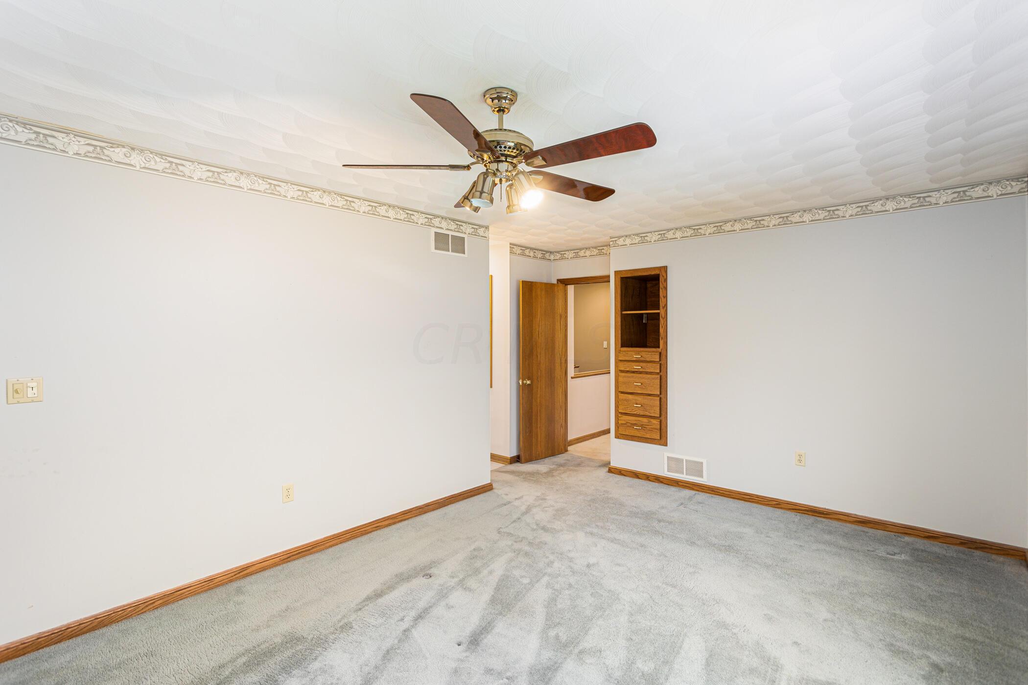 8091 Dustin Road Galena, OH 43021 - Photo 51 of 72 Spacious Master Bedroom with Built-Ins