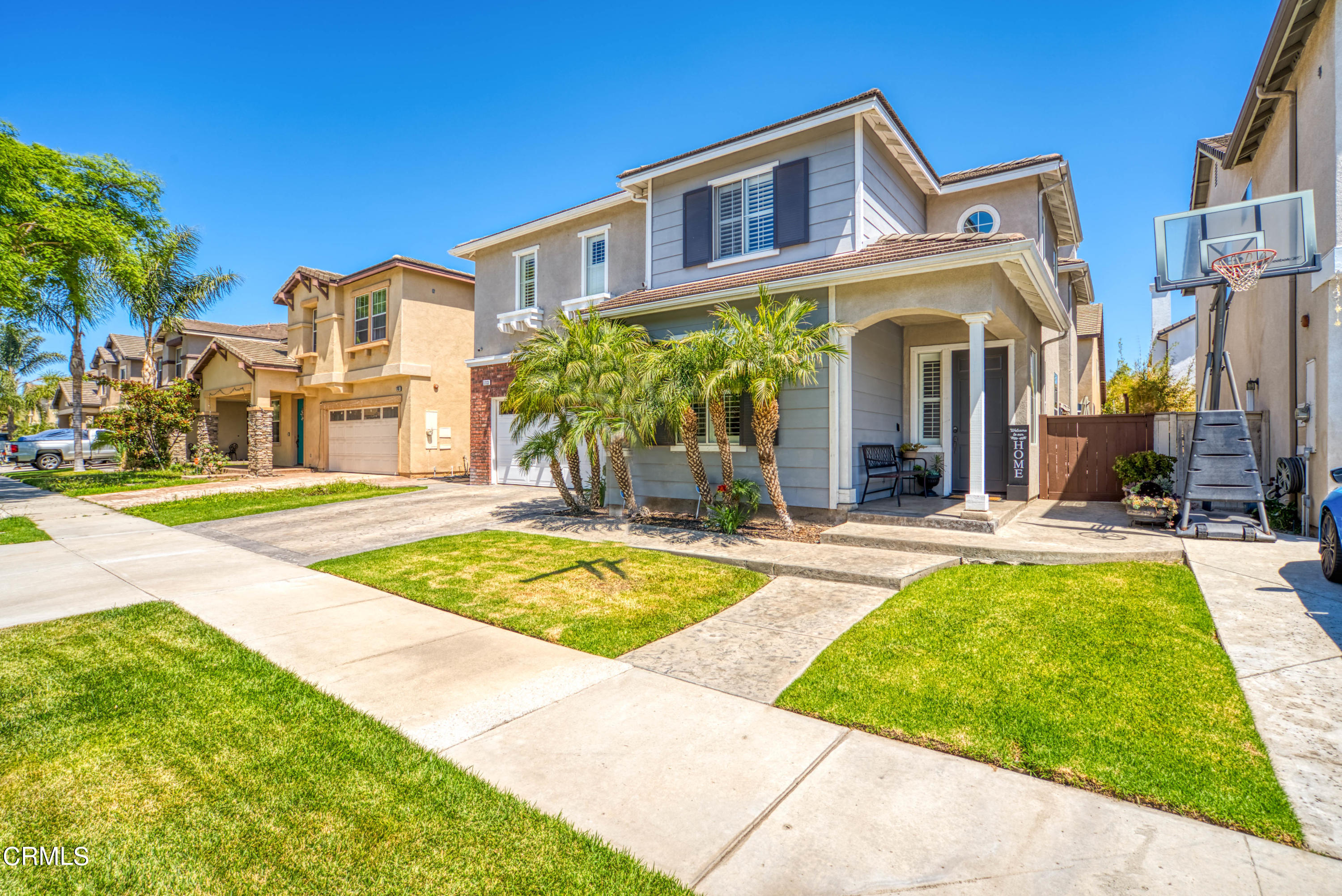 1713 Tiesa Lane Oxnard, CA 93030 - Photo 2 of 48 a view of a house with swimming pool and a yard