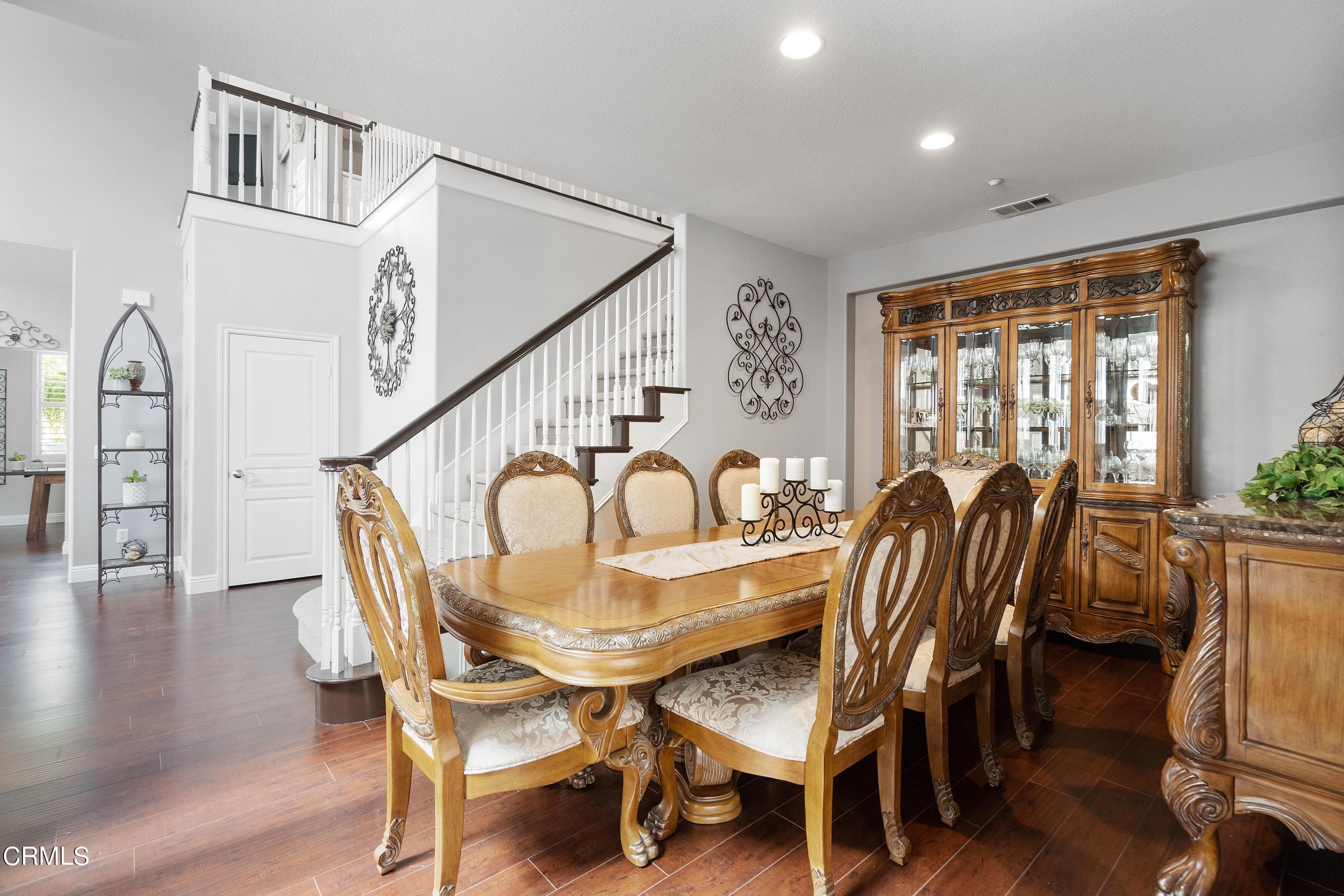 1713 Tiesa Lane Oxnard, CA 93030 - Photo 11 of 48 a view of a a dining room with furniture window and wooden floor