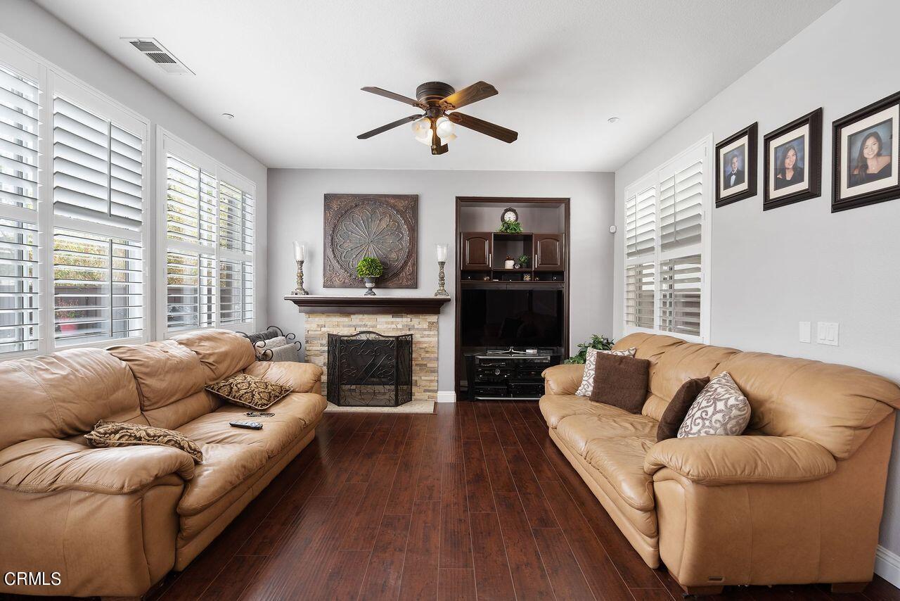 1713 Tiesa Lane Oxnard, CA 93030 - Photo 13 of 48 a living room with furniture and a fireplace