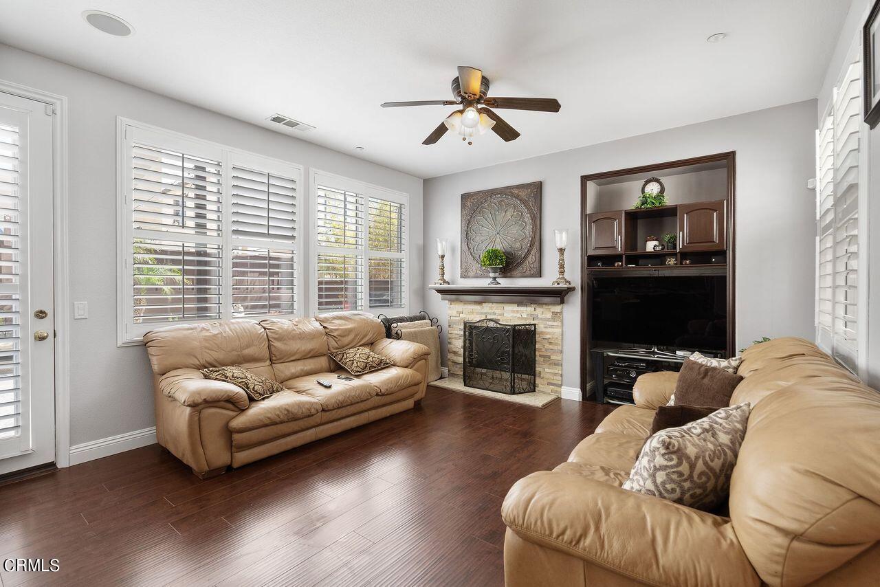 1713 Tiesa Lane Oxnard, CA 93030 - Photo 14 of 48 a living room with furniture and a fireplace