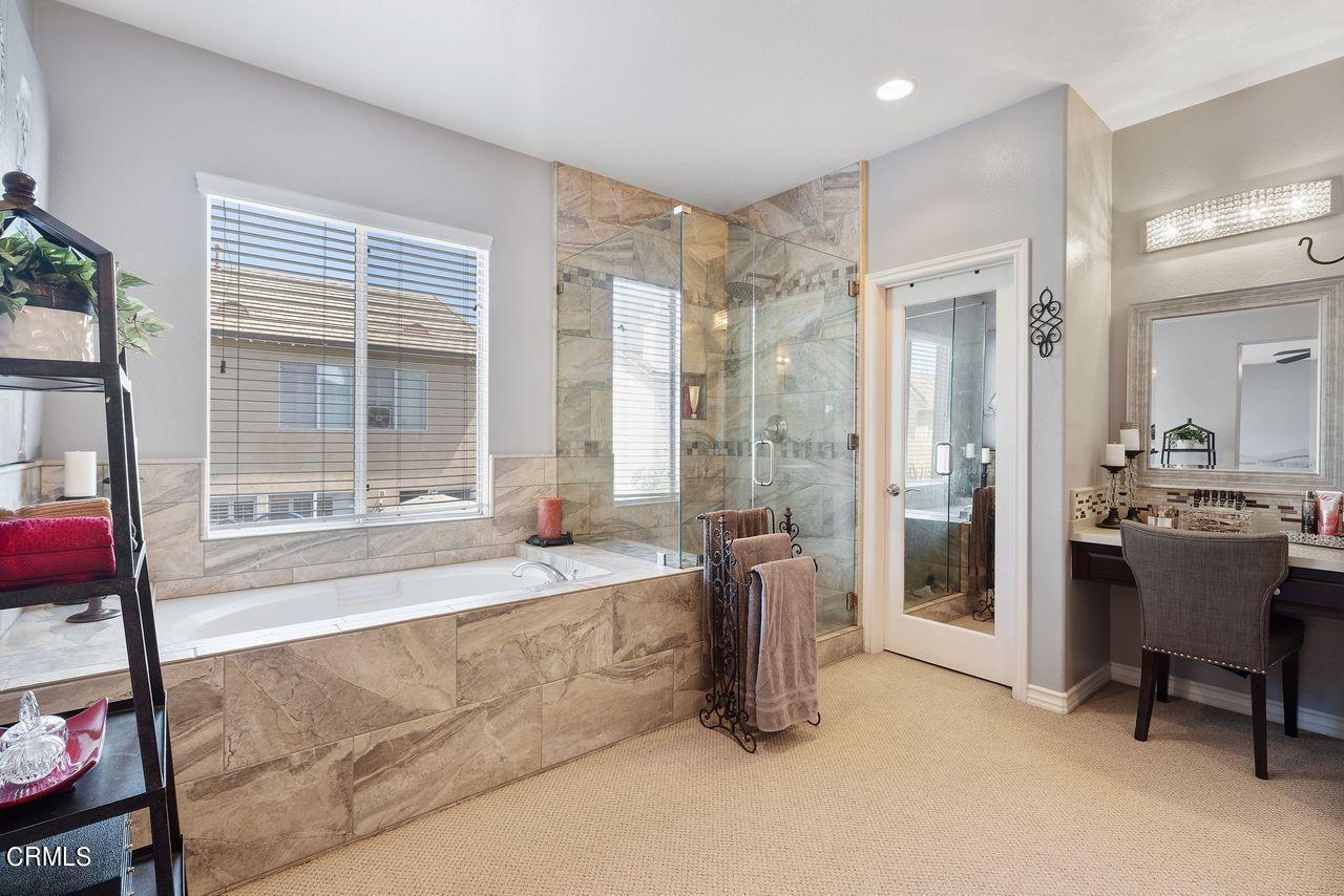 1713 Tiesa Lane Oxnard, CA 93030 - Photo 20 of 48 a spacious bathroom with a tub sink and shower
