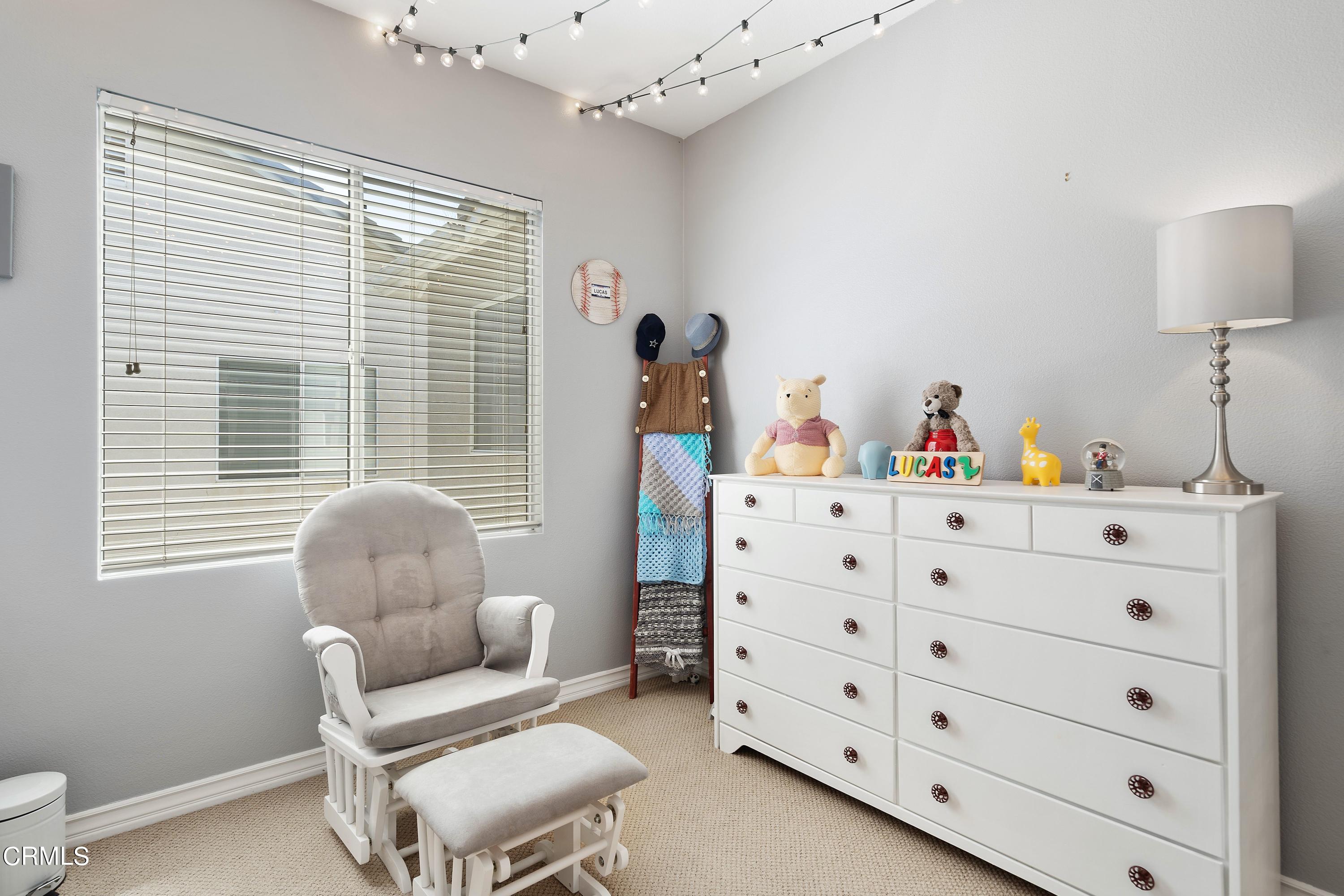 1713 Tiesa Lane Oxnard, CA 93030 - Photo 28 of 48 a living room with furniture and a window
