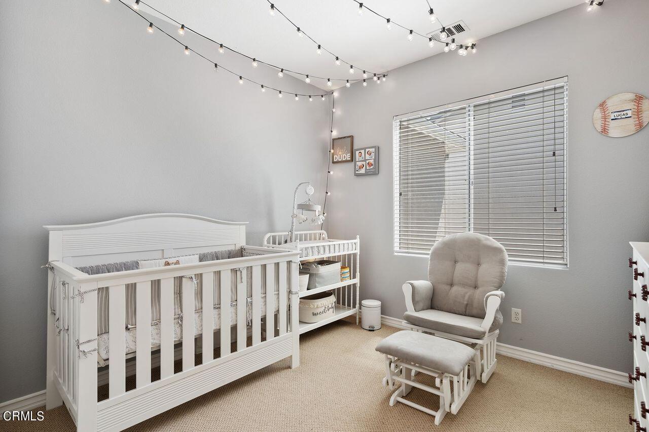 1713 Tiesa Lane Oxnard, CA 93030 - Photo 29 of 48 a bedroom with furniture and a window