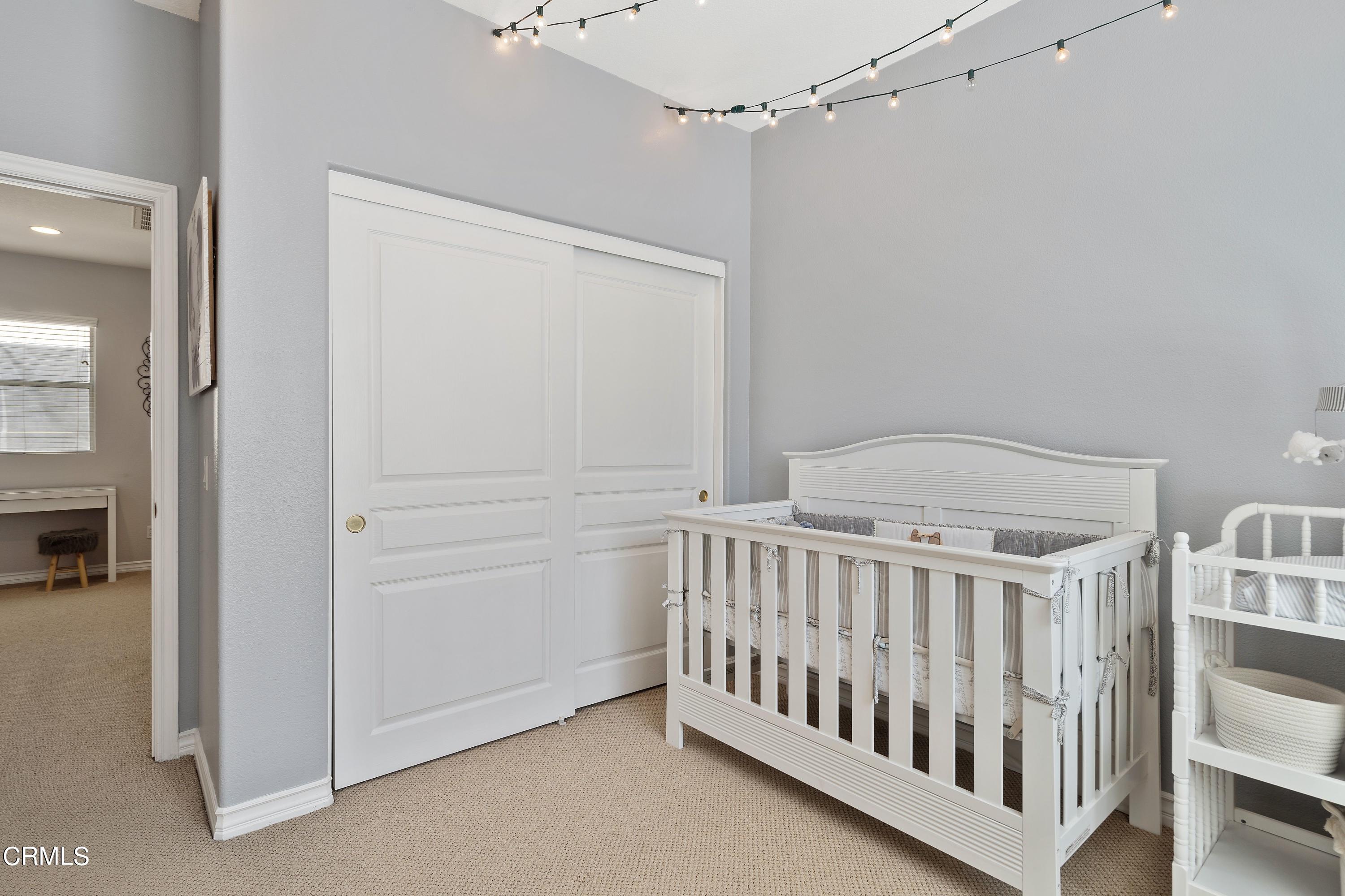 1713 Tiesa Lane Oxnard, CA 93030 - Photo 30 of 48 a view of bedroom with baby crib