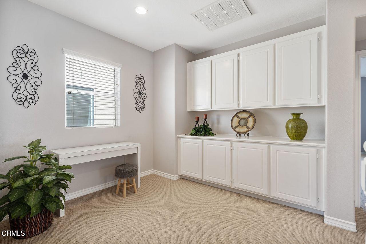 1713 Tiesa Lane Oxnard, CA 93030 - Photo 36 of 48 a view of cabinets a window and wooden floor
