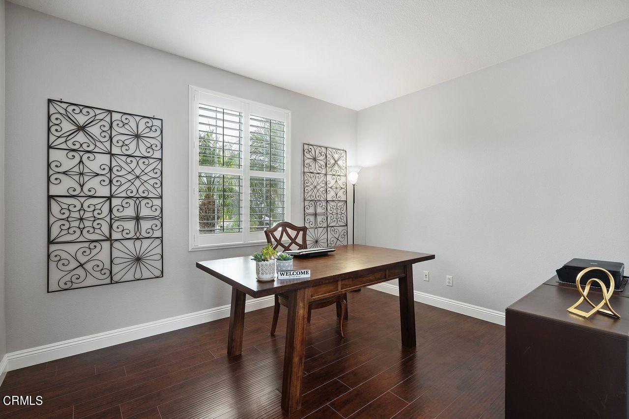 1713 Tiesa Lane Oxnard, CA 93030 - Photo 38 of 48 a view of a workspace with furniture and wooden floor