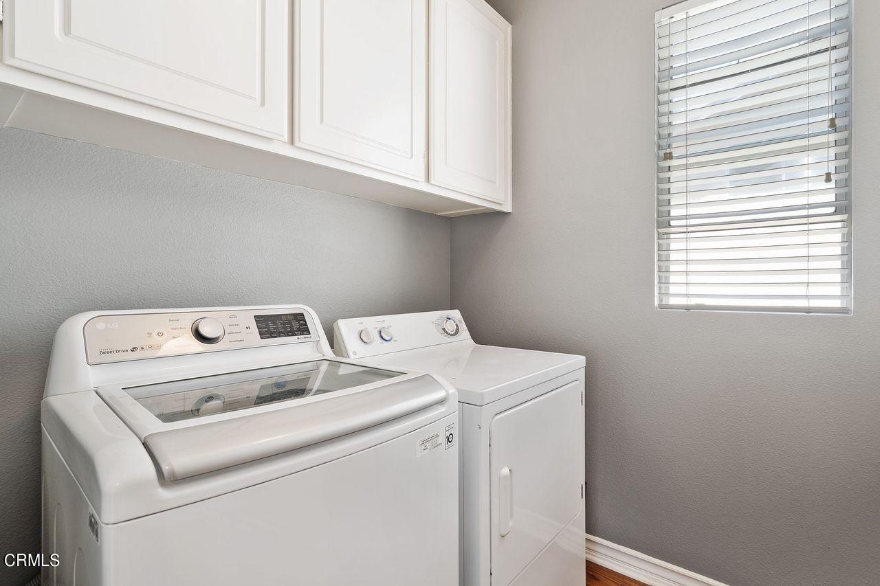 1713 Tiesa Lane Oxnard, CA 93030 - Photo 39 of 48 a utility room with dryer and washer