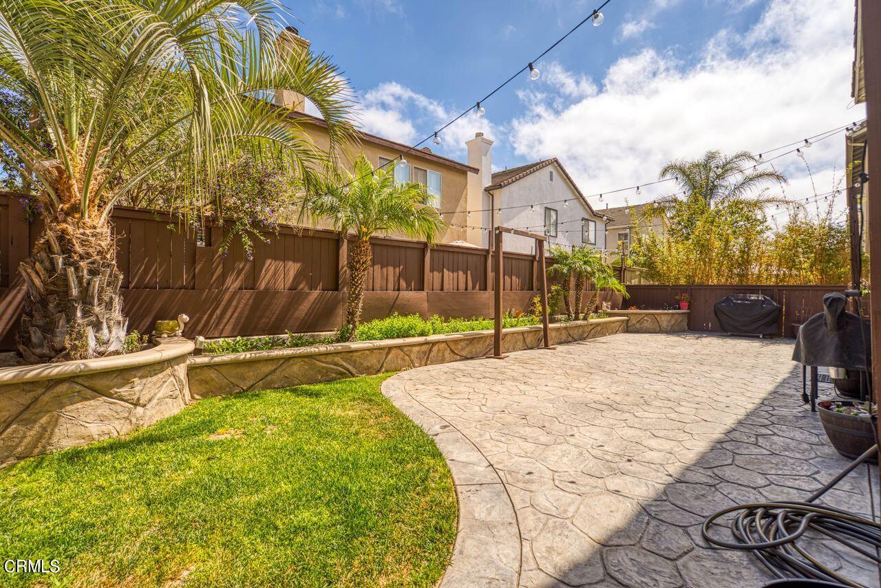 1713 Tiesa Lane Oxnard, CA 93030 - Photo 46 of 48 a house with swimming pool in front of it