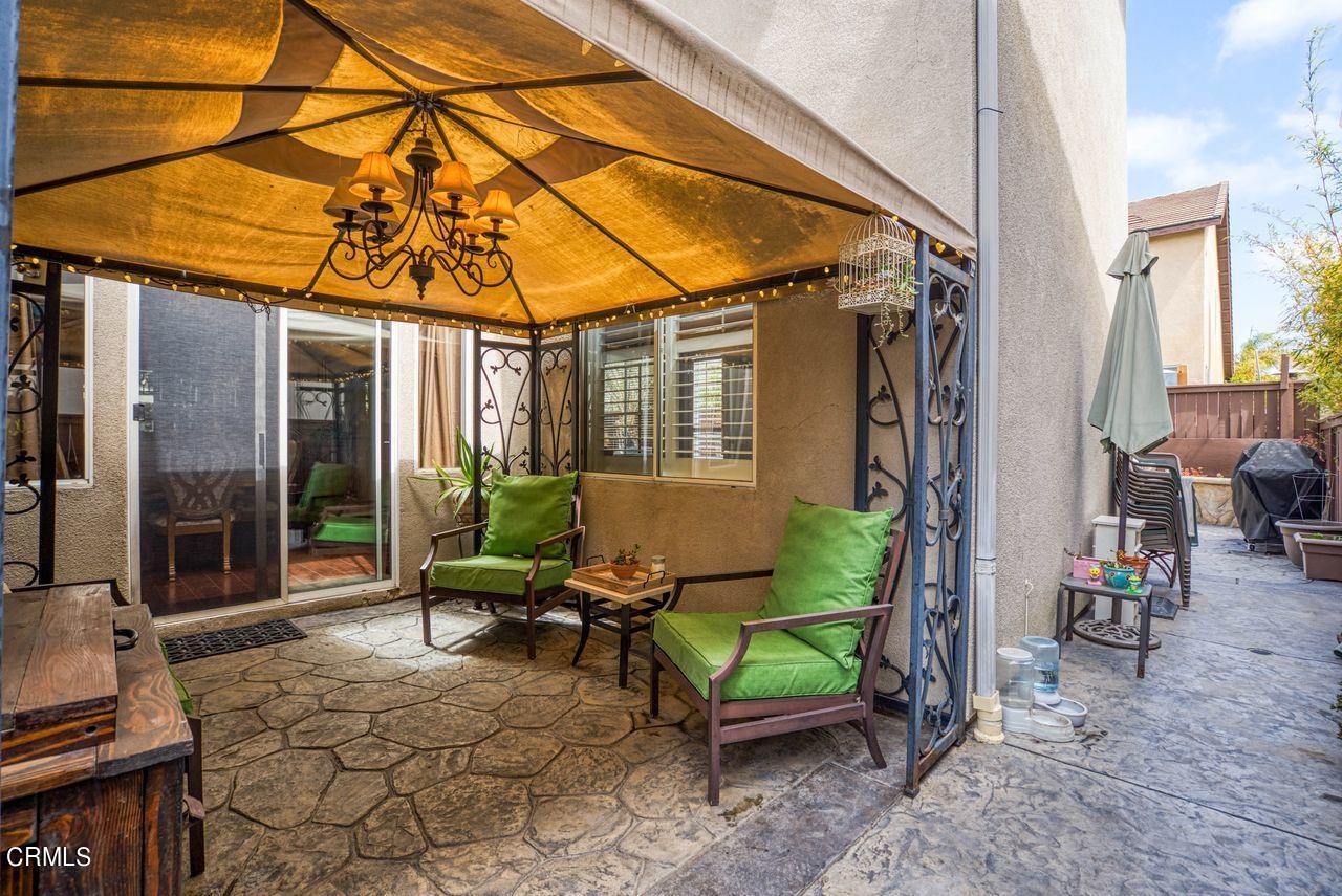 1713 Tiesa Lane Oxnard, CA 93030 - Photo 47 of 48 a backyard of a house with outdoor seating