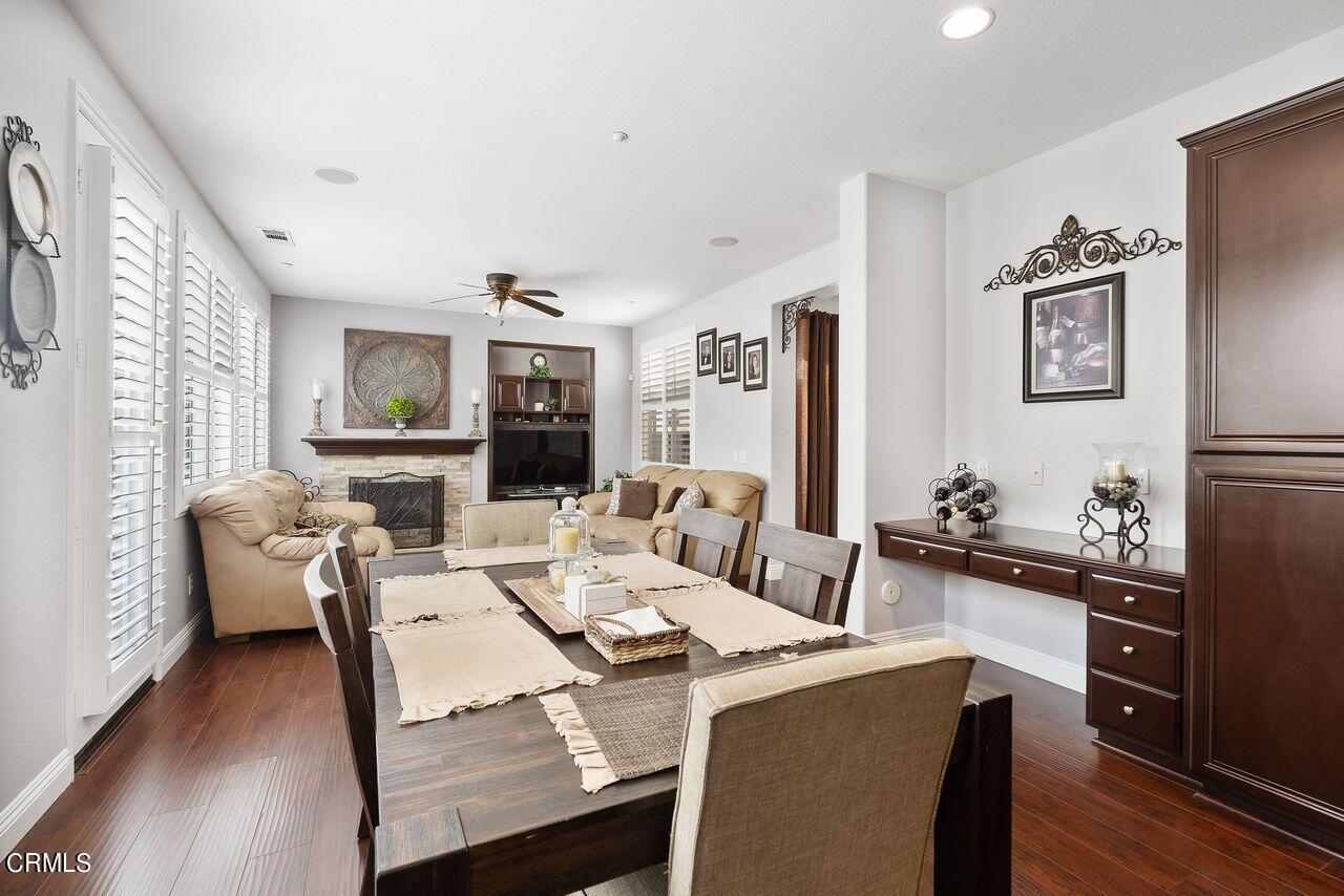 1713 Tiesa Lane Oxnard, CA 93030 - Photo 7 of 48 a view of a dining room with furniture window and wooden floor