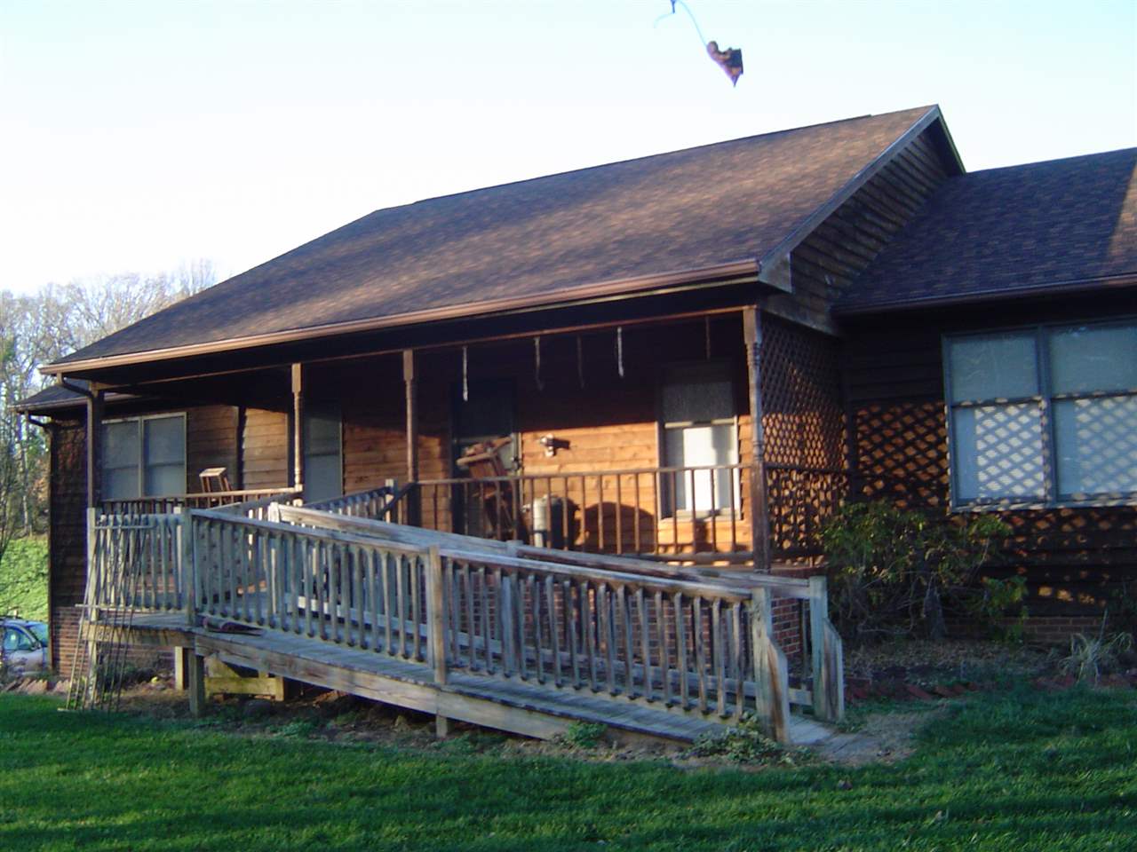 7362 Ottobine Road Dayton, VA 22821 - Photo 1 of 1 a view of a deck with a floor to ceiling window and wooden fence