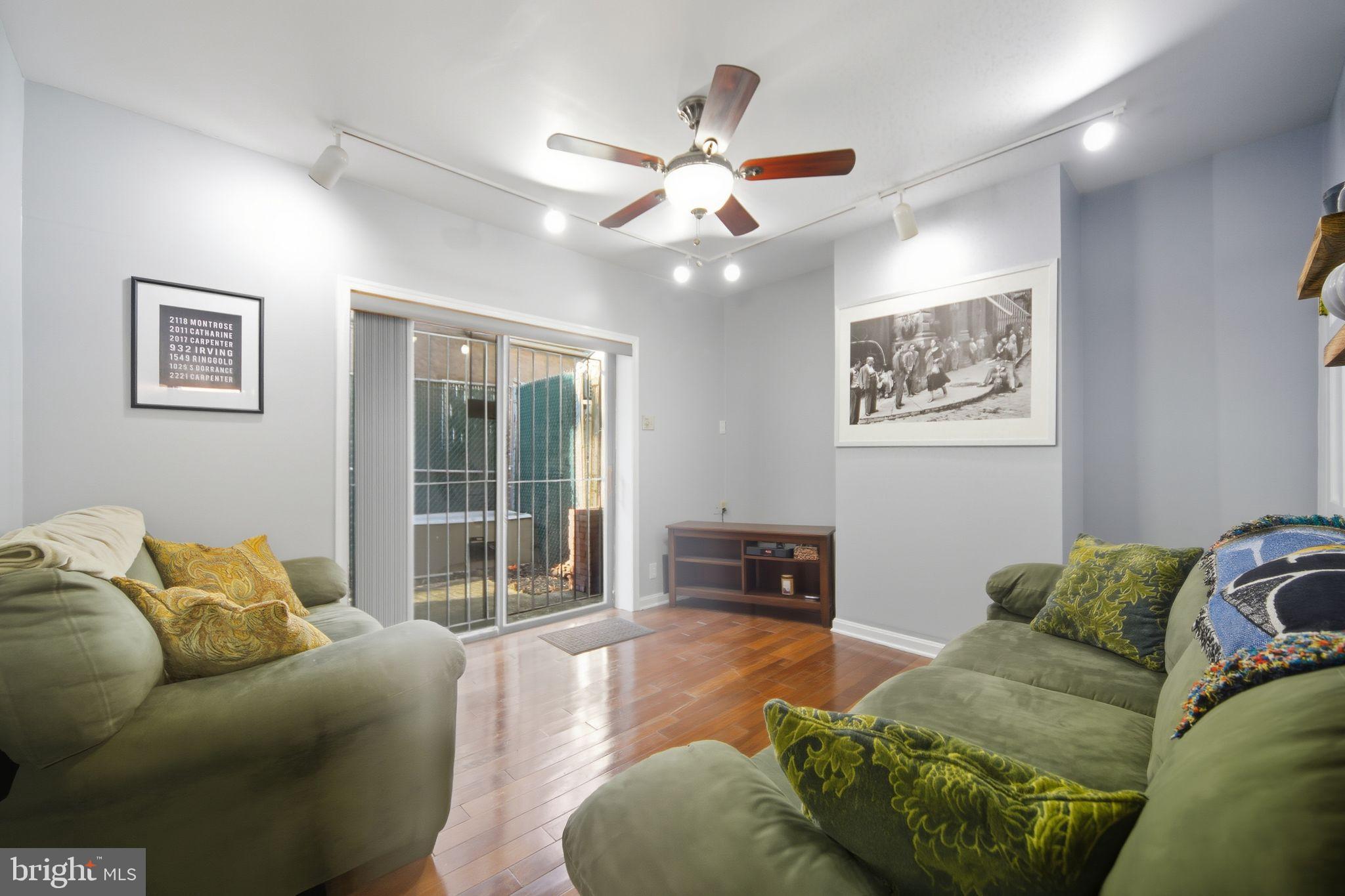 1704 Webster Street Philadelphia, PA 19146 - Photo 13 of 20 a living room with furniture and a window