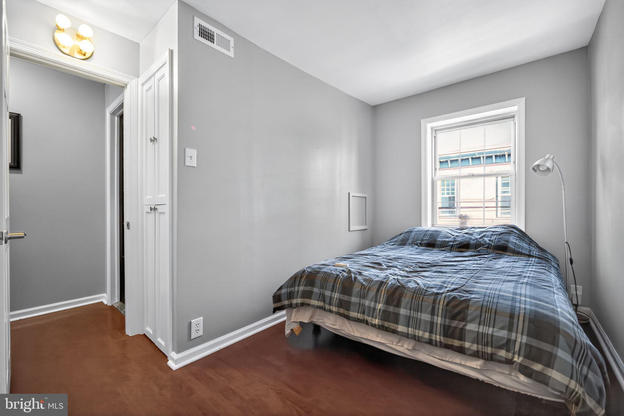 1704 Webster Street Philadelphia, PA 19146 - Photo 15 of 20 a bedroom with a bed and window