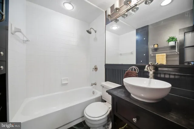 a view of a balcony with furniture