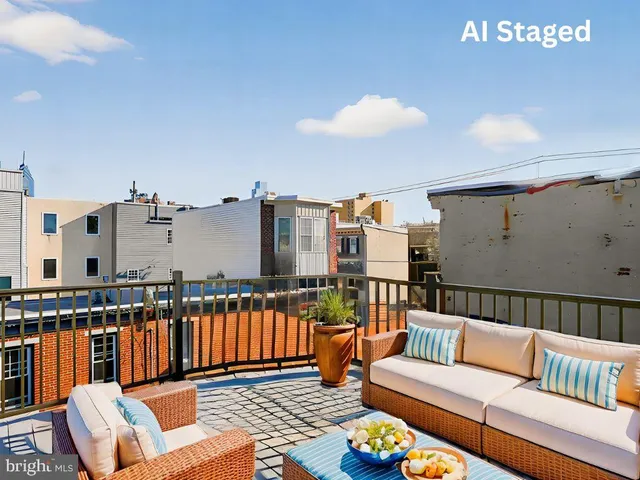 a kitchen with stainless steel appliances granite countertop a refrigerator sink and stove