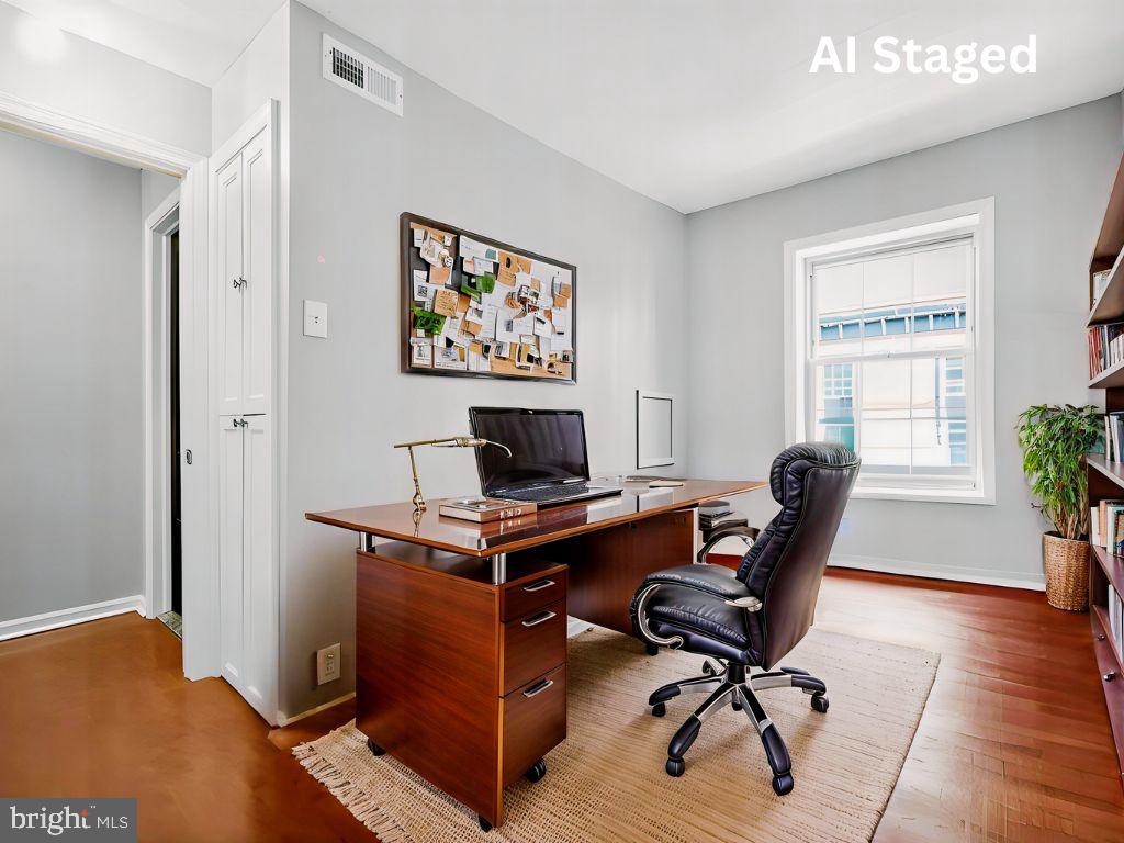 1704 Webster Street Philadelphia, PA 19146 - Photo 6 of 20 a view of a workspace with furniture and a window
