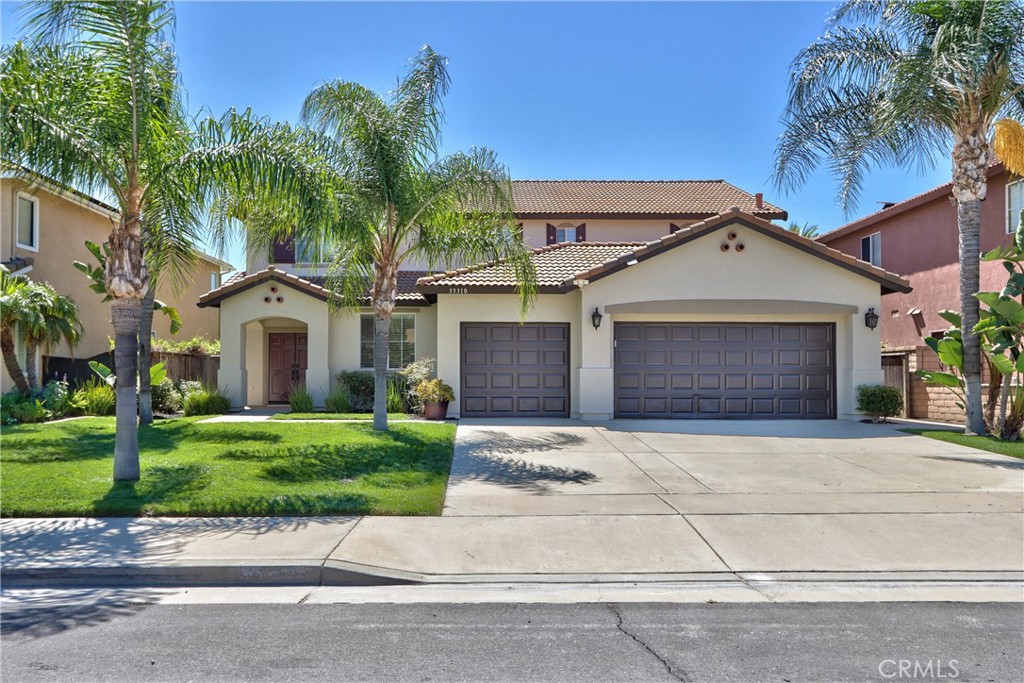 33310 Elizabeth Road Temecula, CA 92592 - Photo 1 of 1 a front view of a house with a garden and entryway