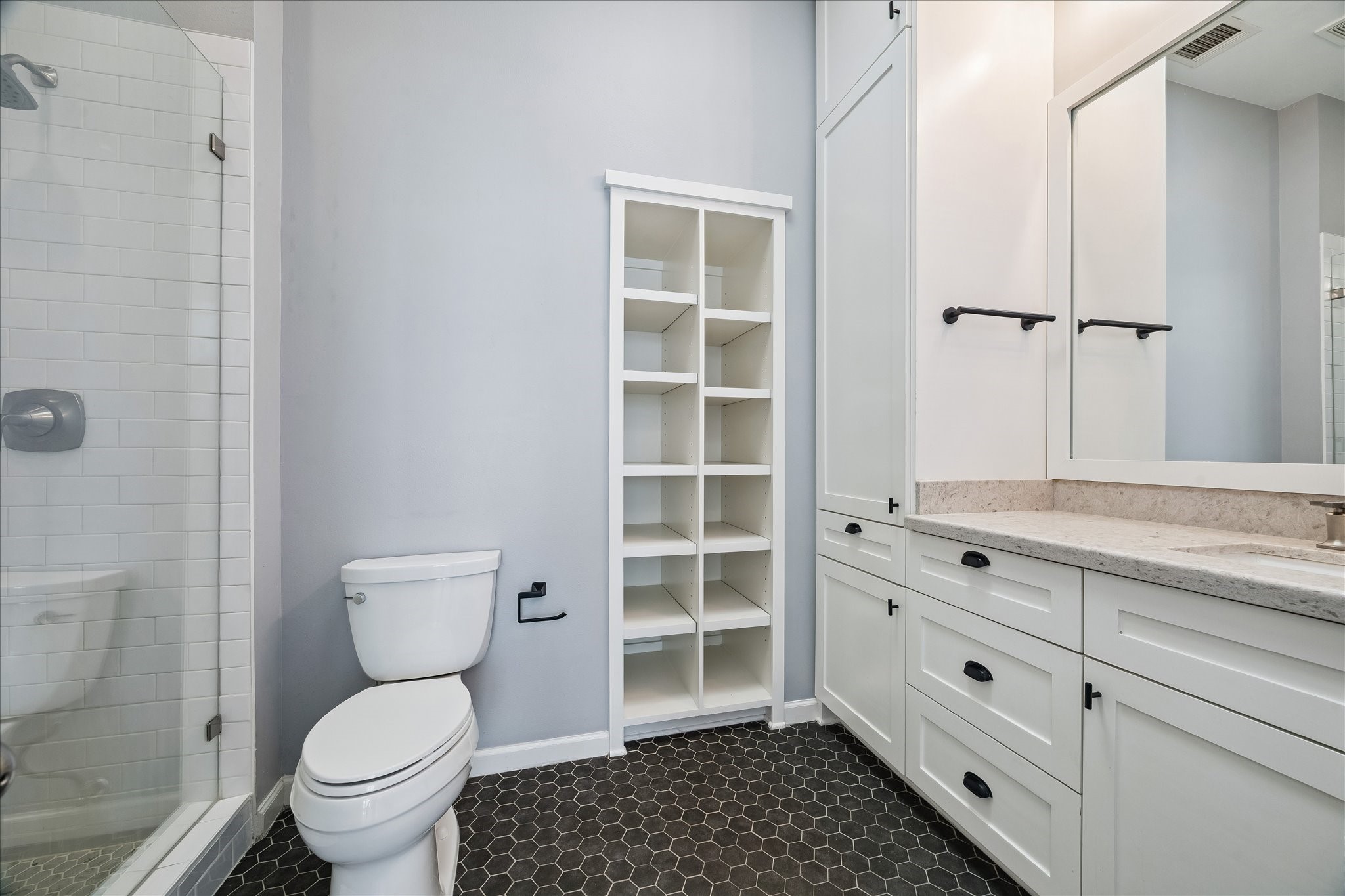 3001 Austin Street Houston, TX 77004 - Photo 14 of 26 Updated primary bath with large walk in shower.