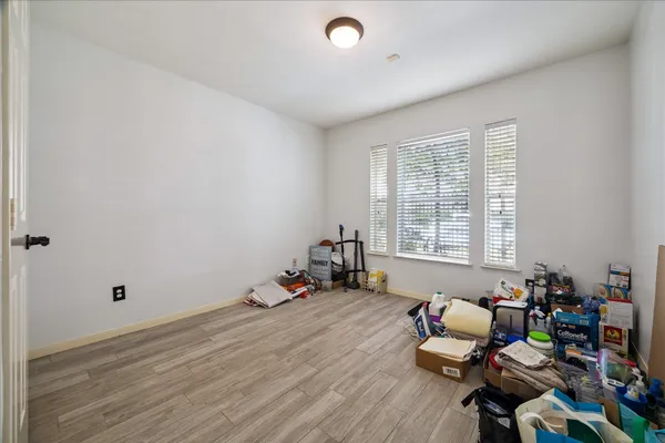 a room with furniture and a window