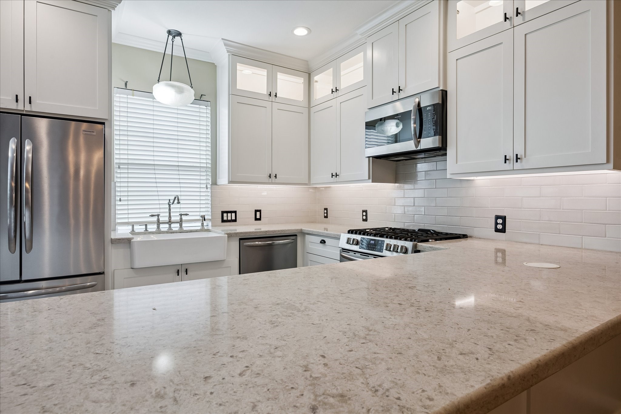 3001 Austin Street Houston, TX 77004 - Photo 4 of 26 beautiful apron front sink, ample counter space, stainelss steel appliances, and shaker cabinets means this kitchen never goes out of style.