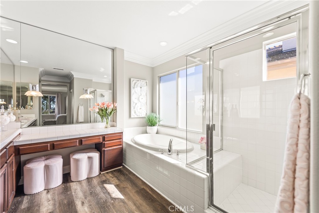51 Rolling Ridge Rancho Santa Margarita, CA 92688 - Photo 28 of 61 a large bathroom with a bathtub and a sink