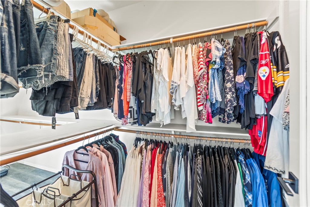 51 Rolling Ridge Rancho Santa Margarita, CA 92688 - Photo 30 of 61 a view of walk in closet with clothes