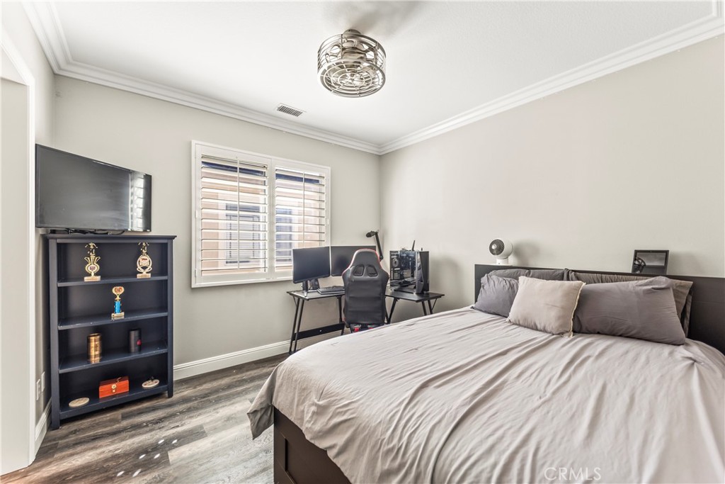 51 Rolling Ridge Rancho Santa Margarita, CA 92688 - Photo 31 of 61 a bedroom with a bed and window