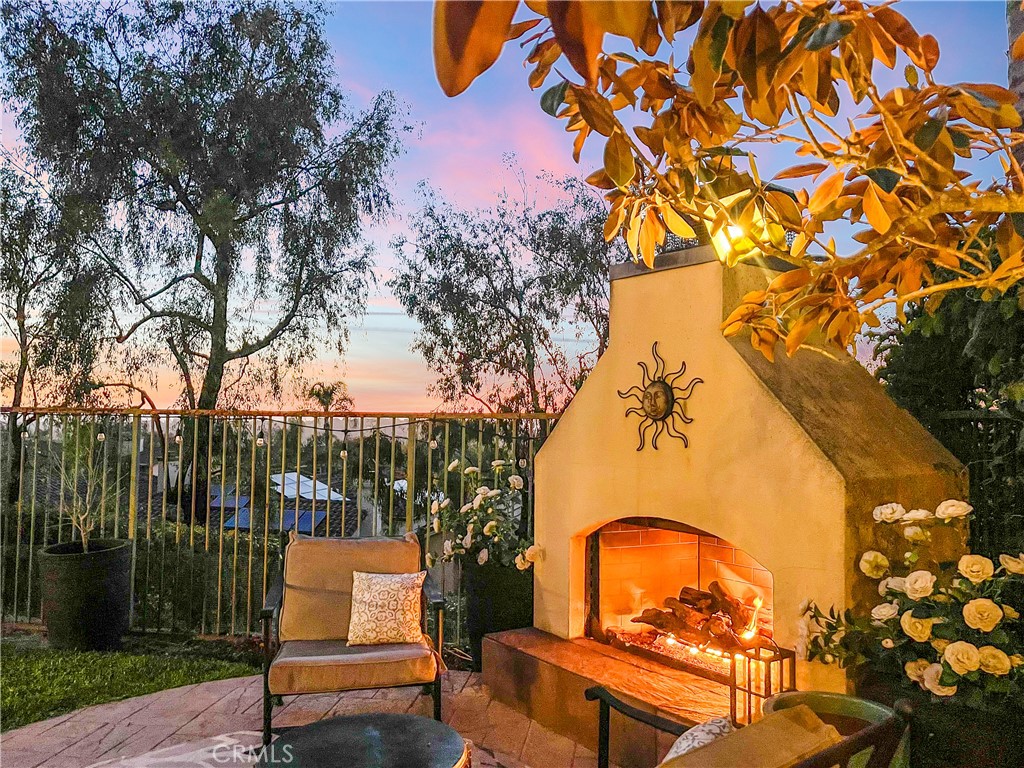 51 Rolling Ridge Rancho Santa Margarita, CA 92688 - Photo 52 of 61 a backyard of a house with table and chairs