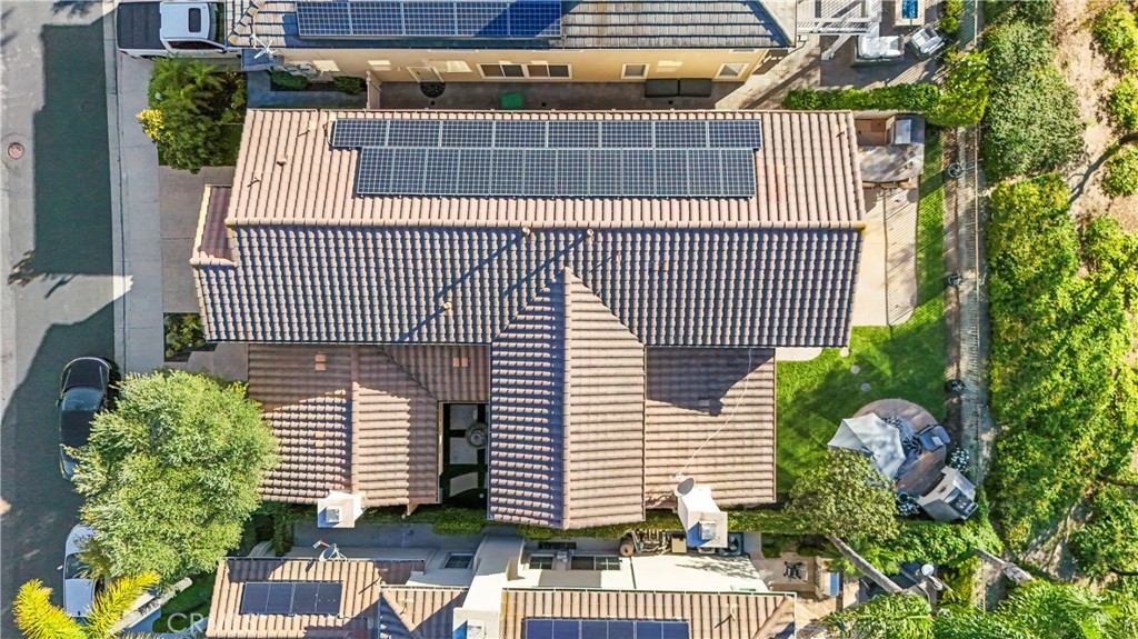 51 Rolling Ridge Rancho Santa Margarita, CA 92688 - Photo 58 of 61 a view of a brick house with a flower plant